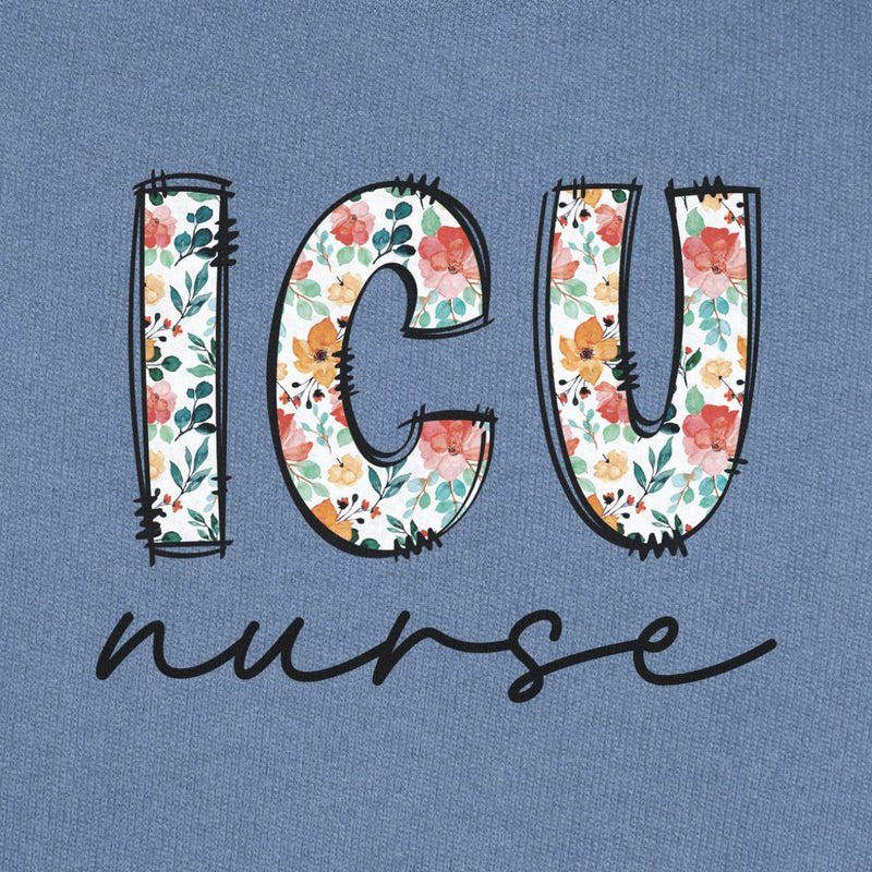 ICU Nurse Floral Sweatshirt in Blue Jean, close-up of the floral "ICU" letters with black script "nurse" print on a folded crewneck