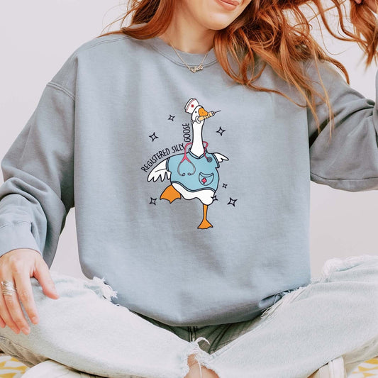 Registered Silly Goose Nurse Sweatshirt – Playful Crewneck with Goose in Scrubs