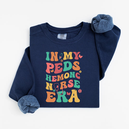 In My PEDS Hemonc Nurse Era Sweatshirt – Colorful Groovy Crewneck for Pediatric Oncology Nurses