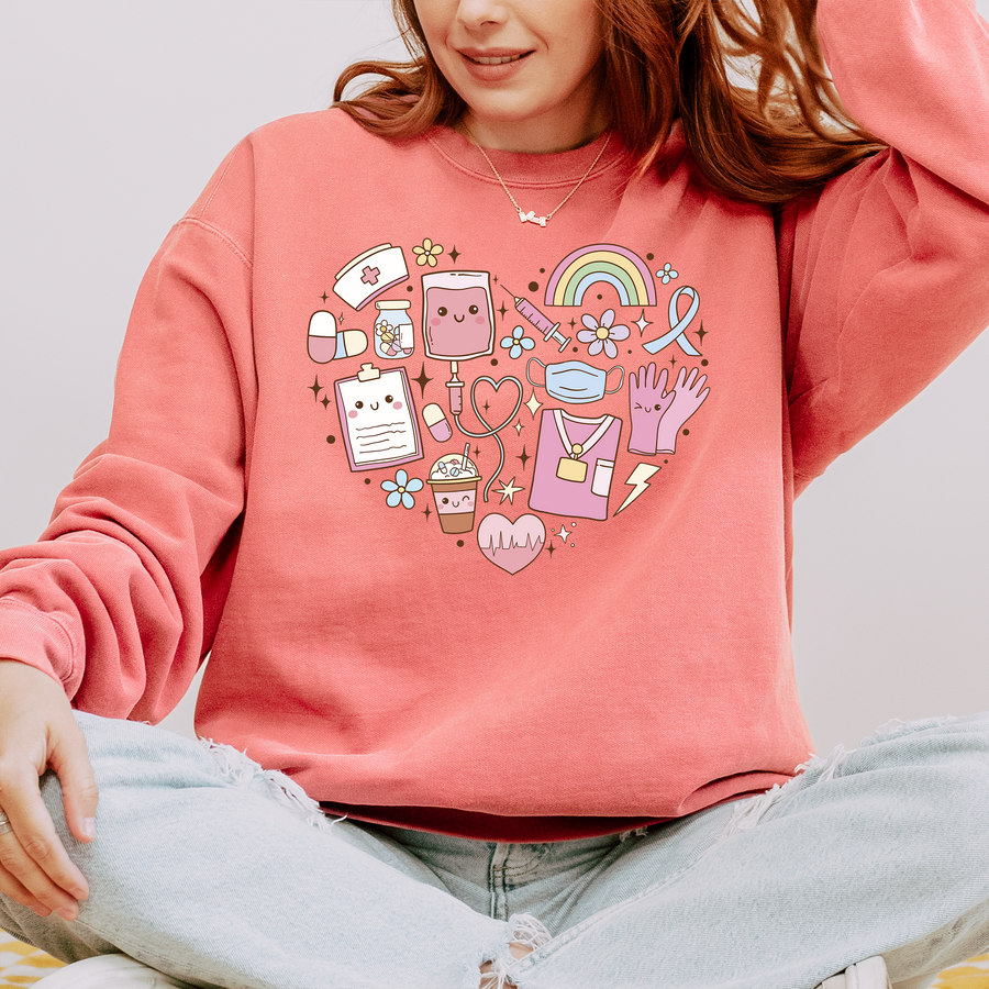 Model wearing the kawaii nurse sweatshirt with pastel medical doodles in a heart shape