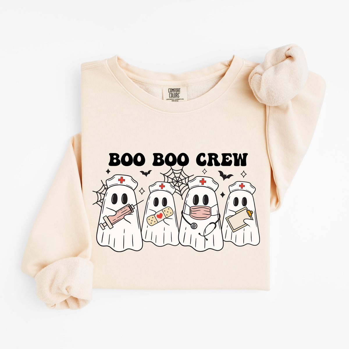 Ivory Boo Boo Crew nurse ghost sweatshirt flat lay, four nurse ghosts with syringe, bandage, stethoscope and clipboard, Comfort Colors 1466