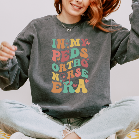 In My PEDS Ortho Nurse Era Sweatshirt – Groovy Crewneck for Pediatric Orthopedic Nurses