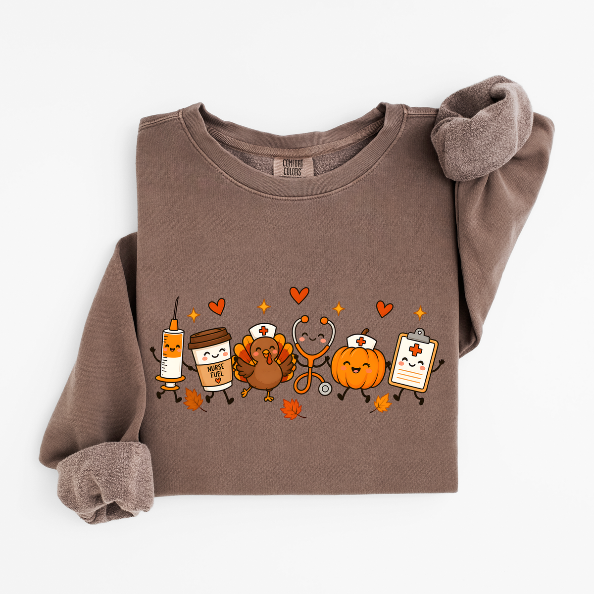 Espresso Thanksgiving Nurse Friends sweatshirt flat lay, turkey, pumpkin, Nurse Fuel coffee, syringe, stethoscope and clipboard characters, Comfort Colors 1466
